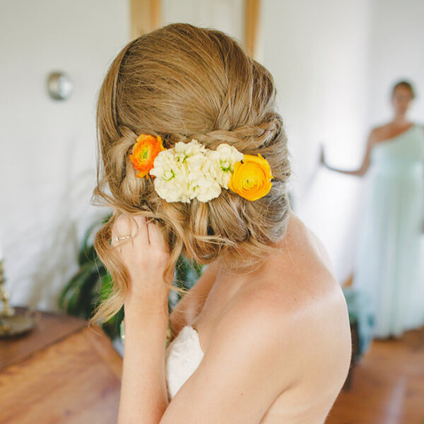 flowers in a brides hairstyle