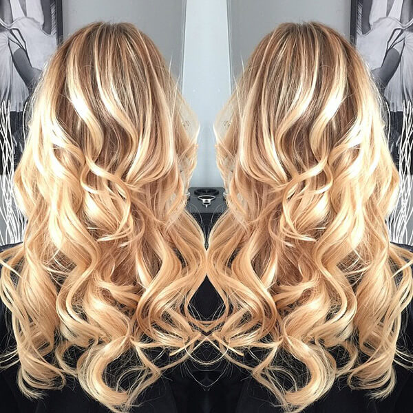 mirror image of a long, curly hairstyle